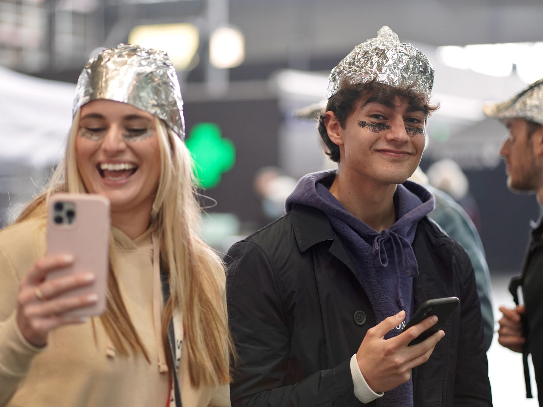 Enlarged view: Students with tinfoils on their head.