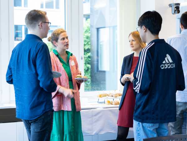 Enlarged view: Participants talking to each other